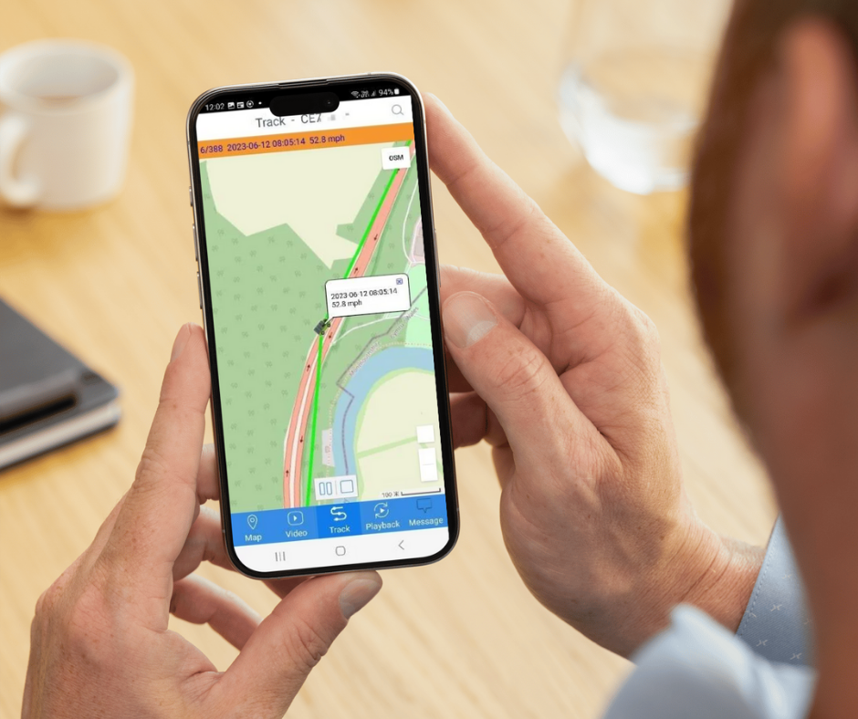 Man using fleet tracking mobile app.